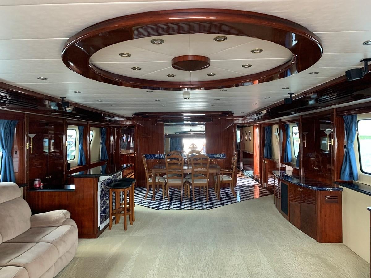 a large room with chairs and a chandelier aboard 117 BILGIN YACHTS 2007  Yacht for Sale