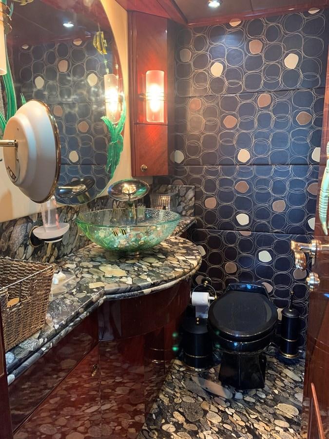 a bathroom with a sink and a mirror aboard 117 BILGIN YACHTS 2007  Yacht for Sale