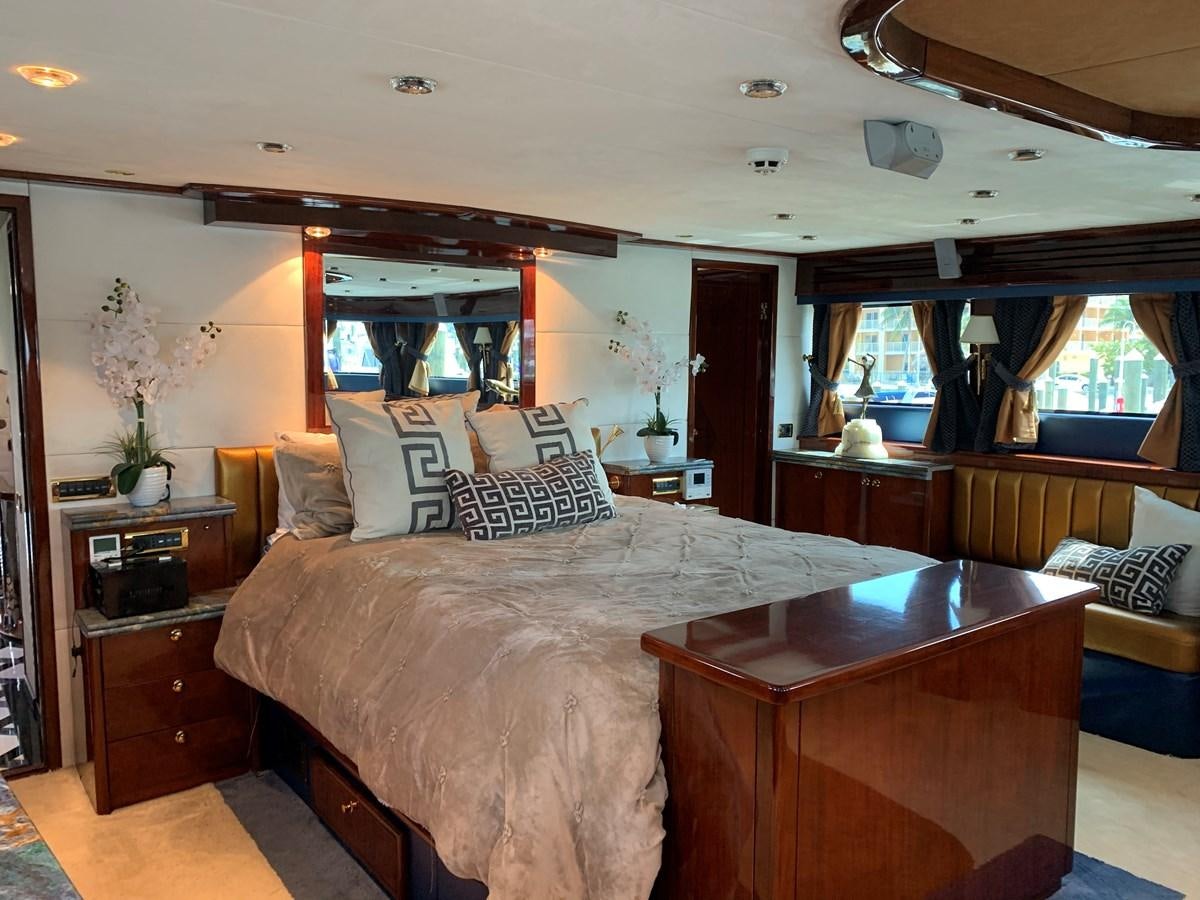 a bedroom with a bed and a desk aboard 117 BILGIN YACHTS 2007  Yacht for Sale