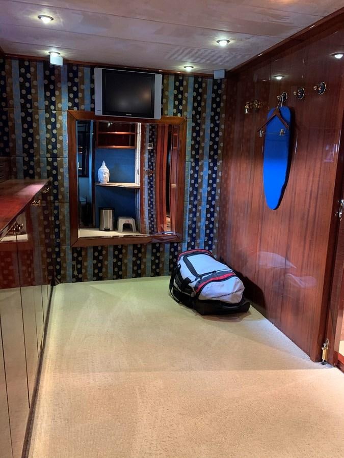 a bedroom with a bed and a backpack aboard 117 BILGIN YACHTS 2007  Yacht for Sale