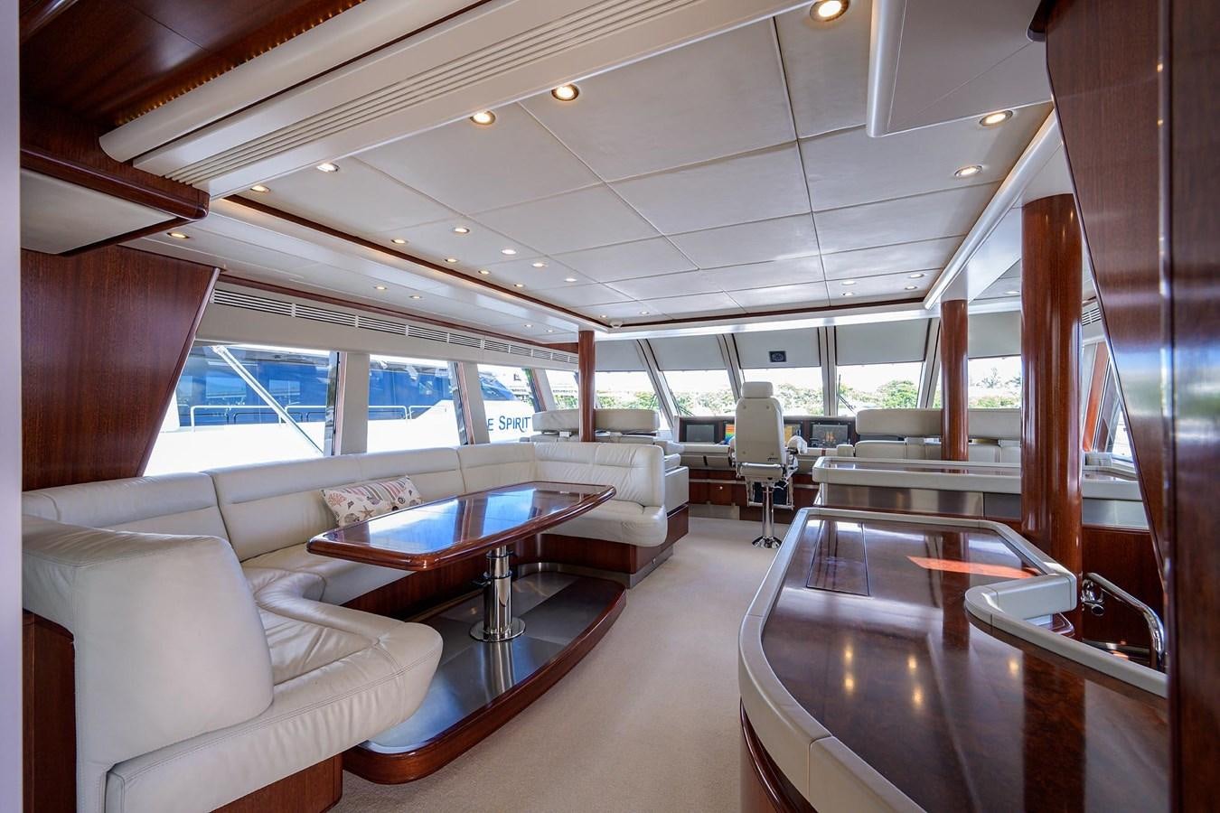a room with a couch and a table aboard TEMPO REALE Yacht for Sale