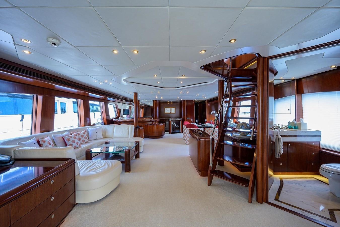 a room with a couch and a table aboard TEMPO REALE Yacht for Sale