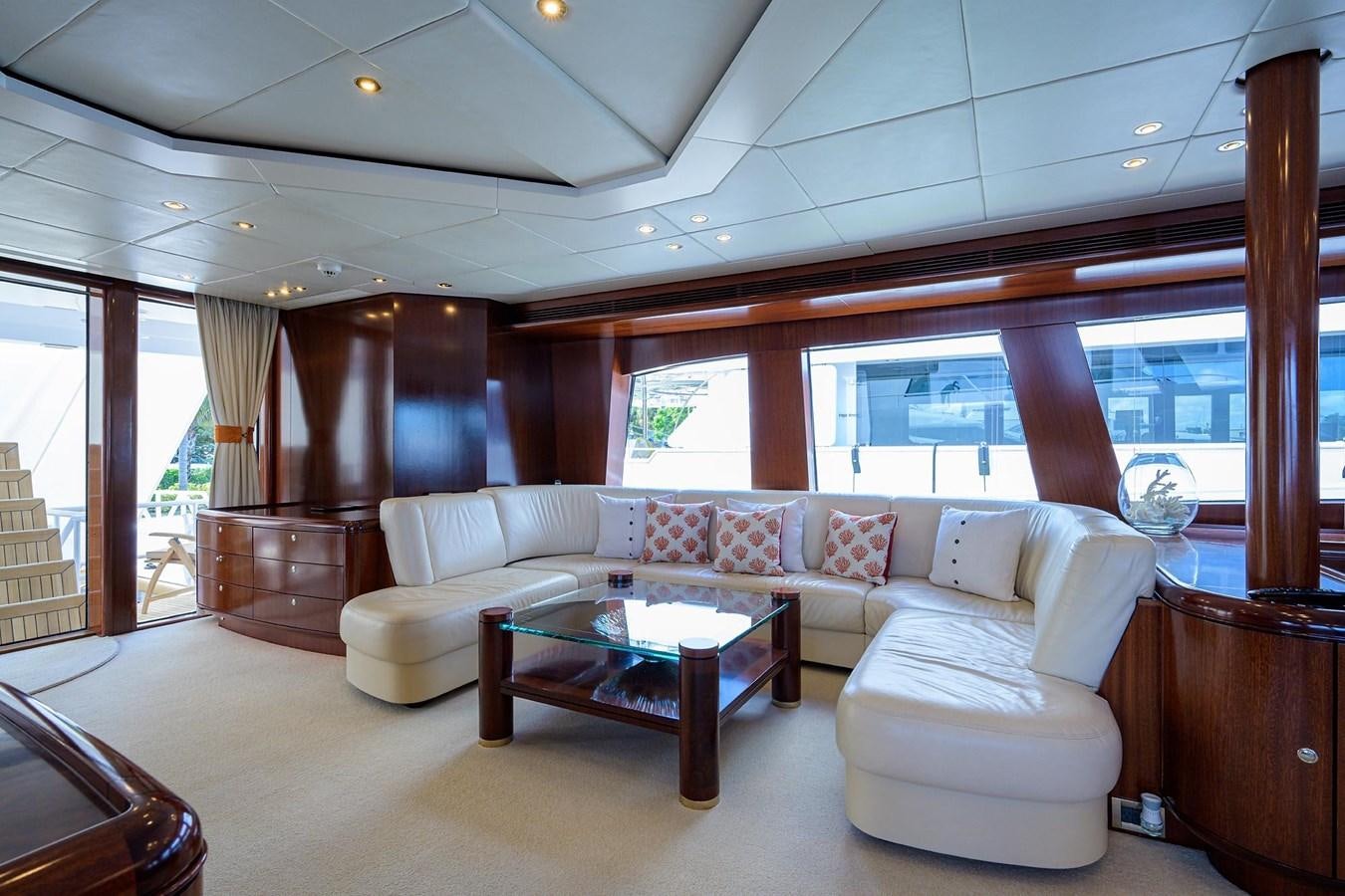 a living room with a large window aboard TEMPO REALE Yacht for Sale