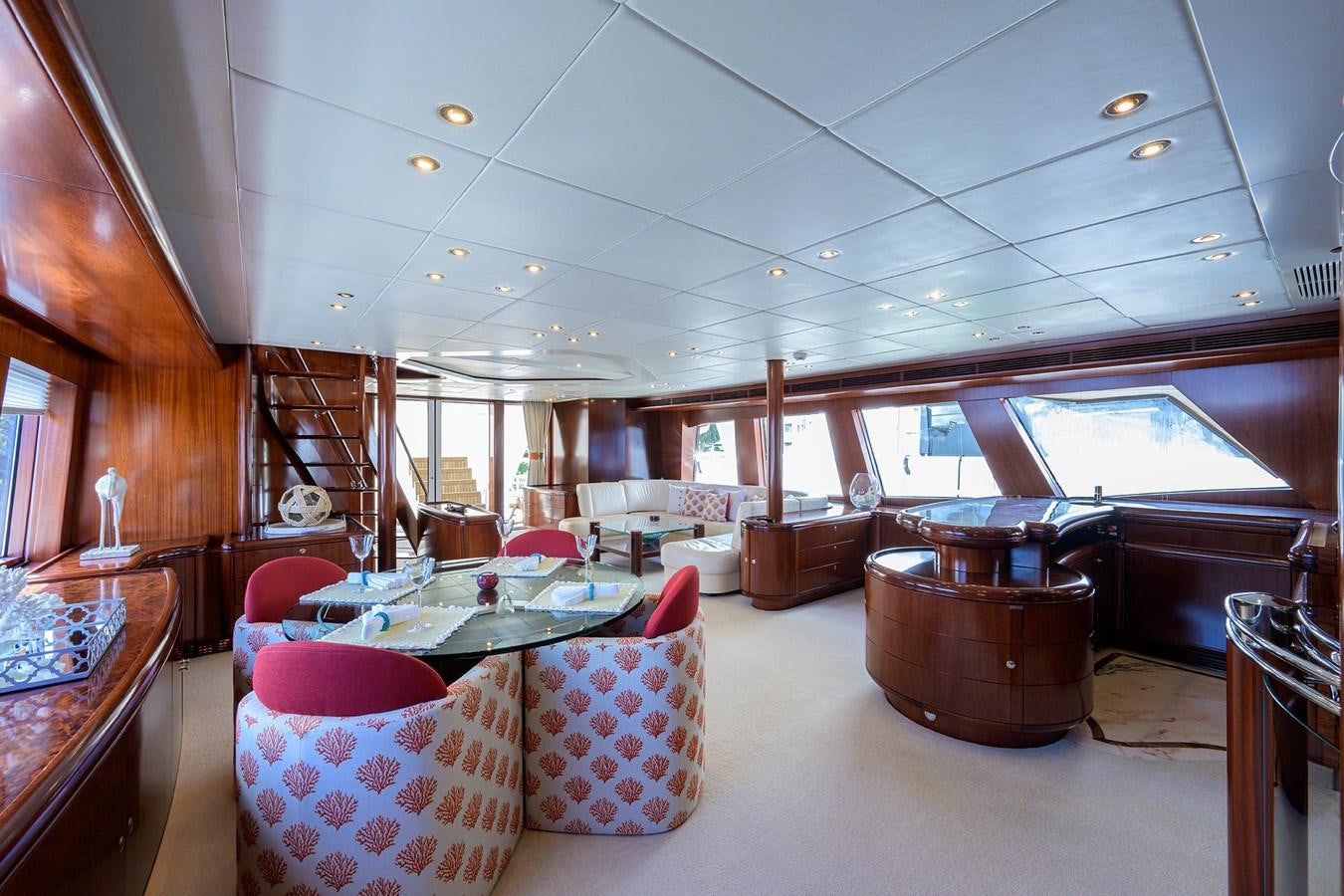 a living room with a piano aboard TEMPO REALE Yacht for Sale