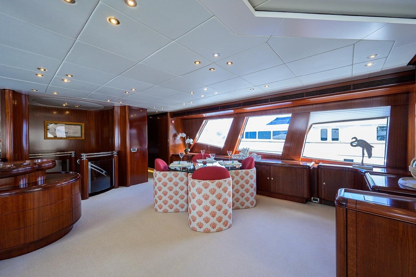 a room with couches and chairs aboard TEMPO REALE Yacht for Sale