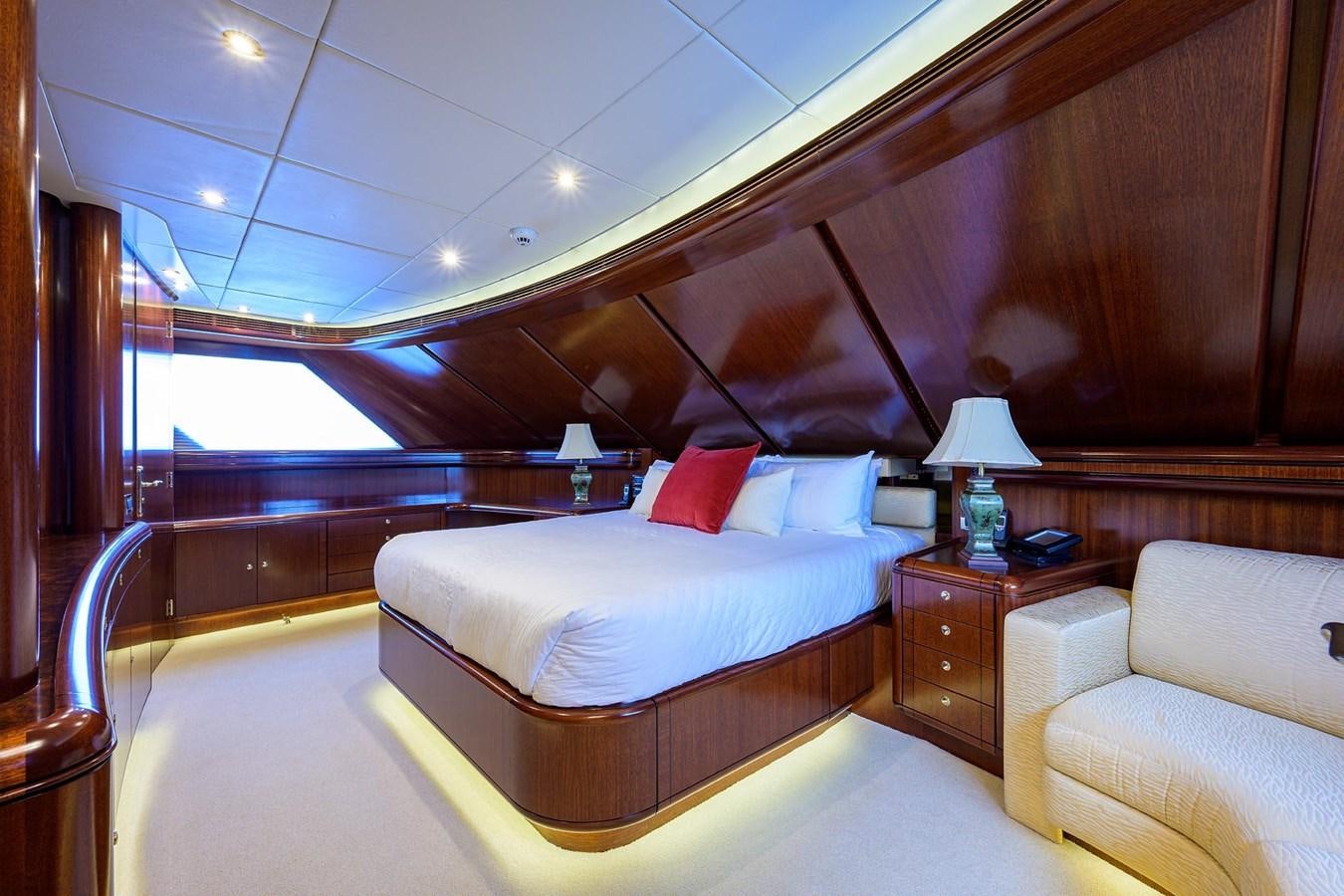 a room with a bed and a couch aboard TEMPO REALE Yacht for Sale