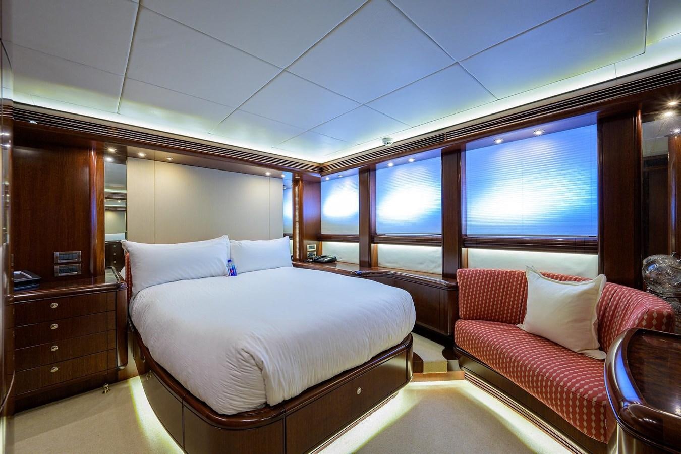 a room with a bed and a window aboard TEMPO REALE Yacht for Sale