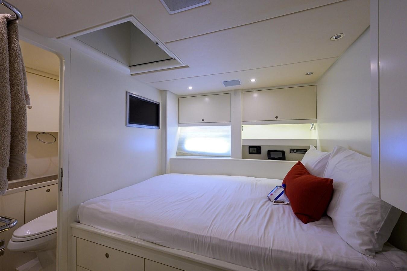 a bed with white sheets aboard TEMPO REALE Yacht for Sale