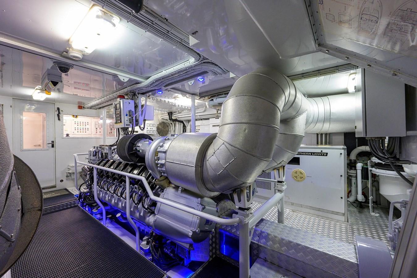 a large machine in a room aboard TEMPO REALE Yacht for Sale