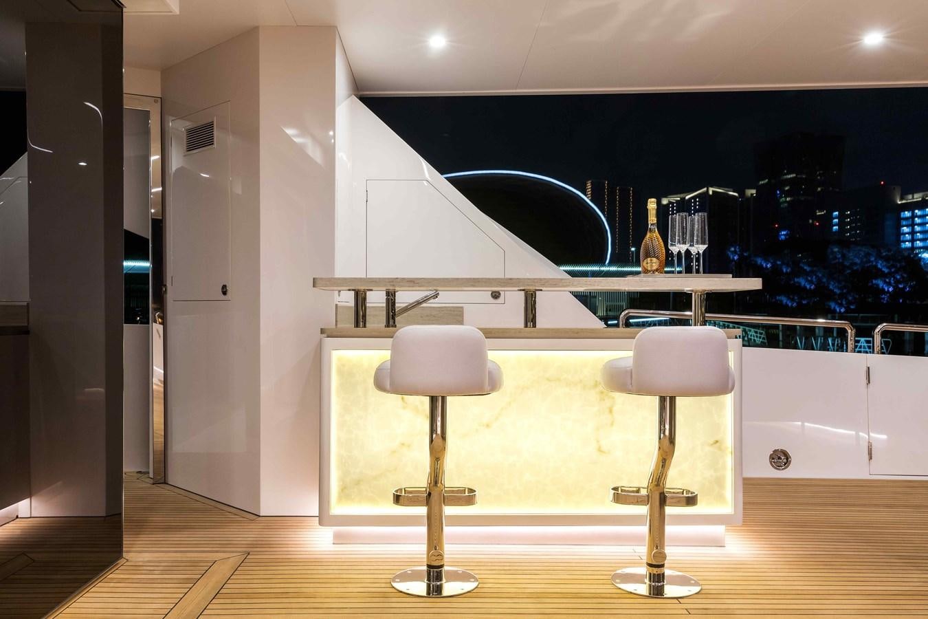 a modern looking kitchen with a large glass window aboard FD110-004 NEW ARRIVAL Yacht for Sale