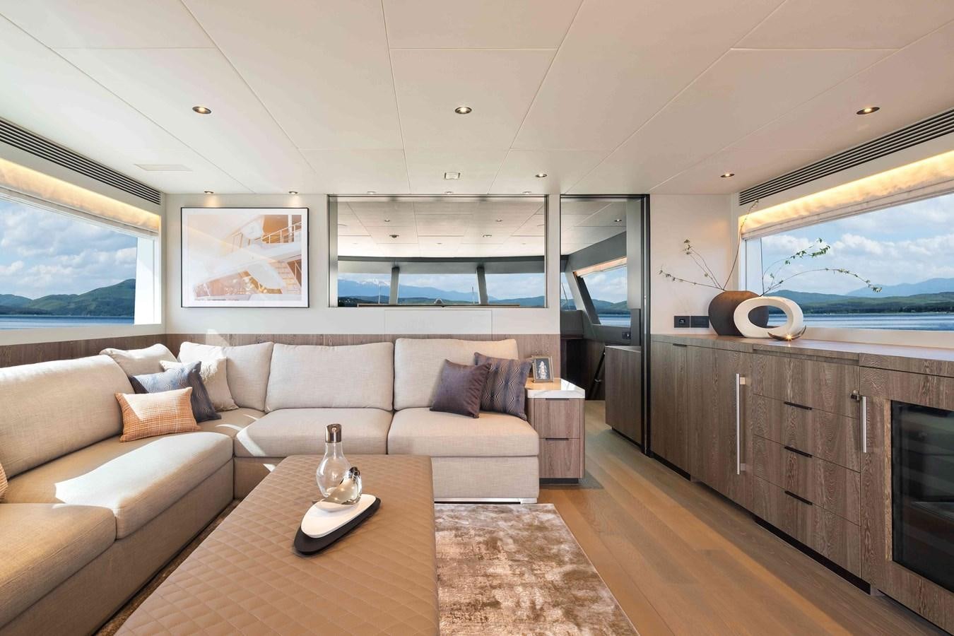 a living room with a couch and a coffee table aboard FD110-004 NEW ARRIVAL Yacht for Sale
