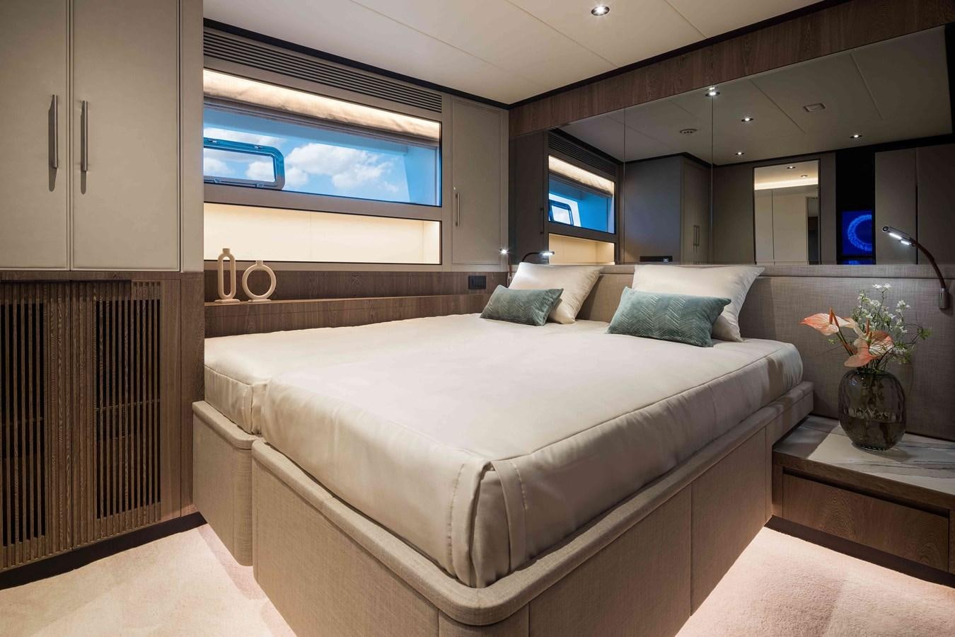 a bed in a room aboard FD110-004 NEW ARRIVAL Yacht for Sale
