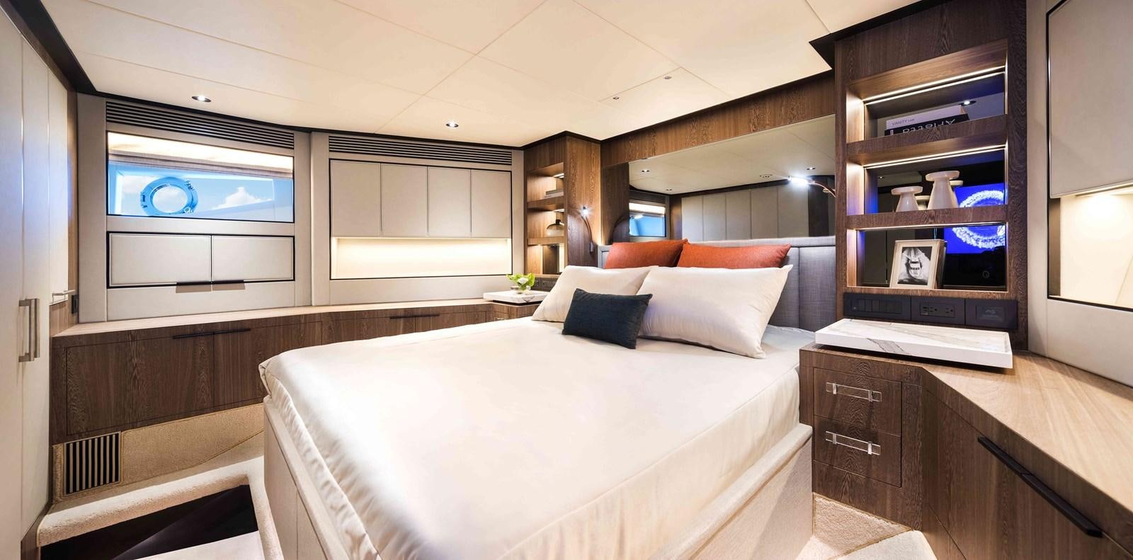 a room with a bed and a shelf aboard FD110-004 NEW ARRIVAL Yacht for Sale