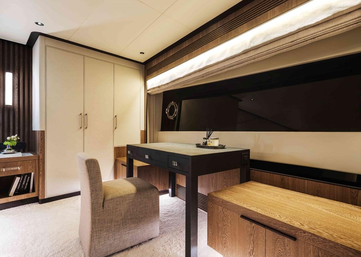 a room with a desk and a chair aboard FD110-004 NEW ARRIVAL Yacht for Sale