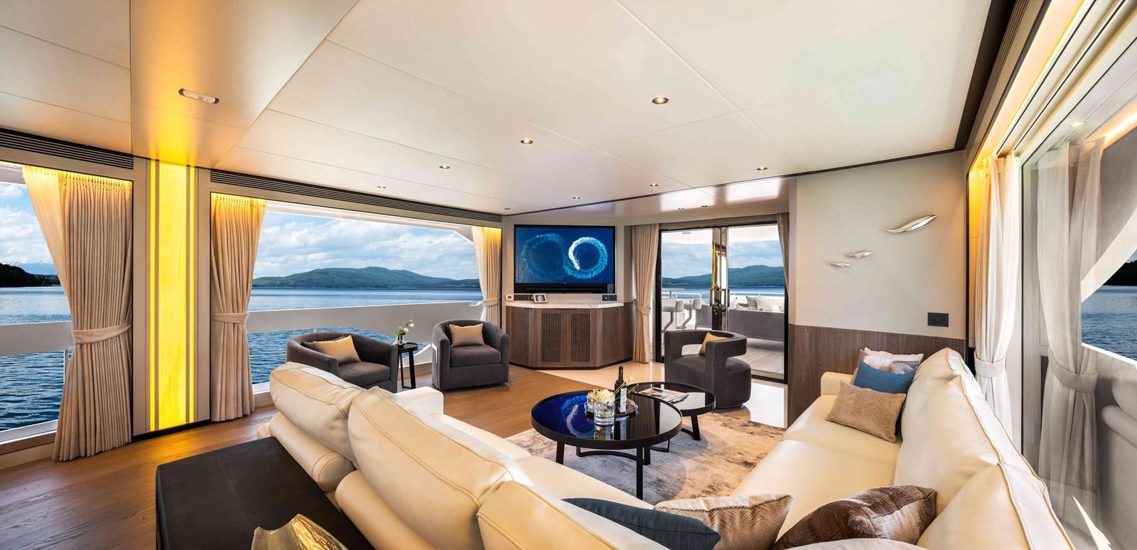 a living room with a large window aboard FD110-004 NEW ARRIVAL Yacht for Sale