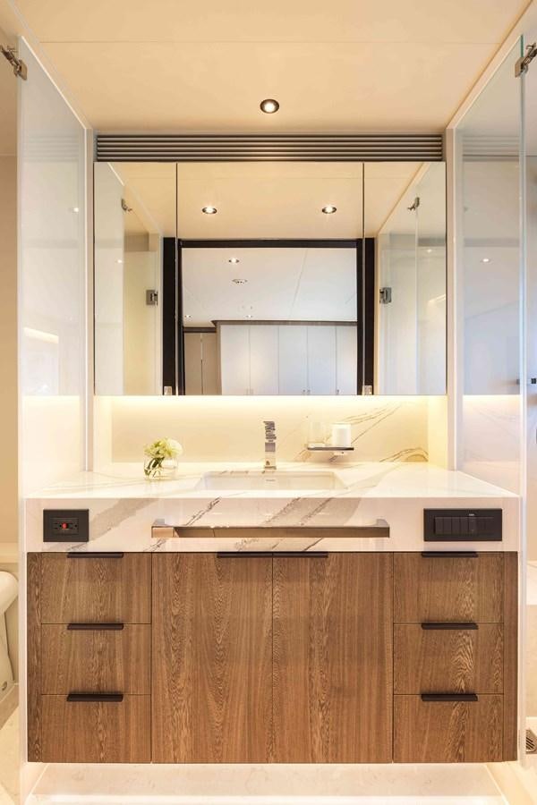 a bathroom with a large mirror aboard FD110-004 NEW ARRIVAL Yacht for Sale