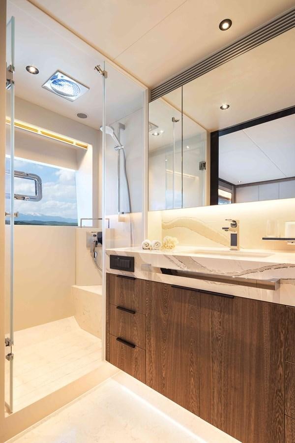 a bathroom with a large mirror aboard FD110-004 NEW ARRIVAL Yacht for Sale