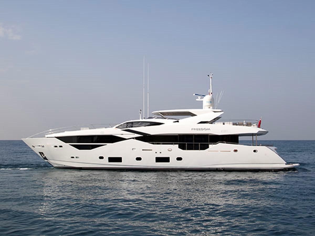 a white yacht in the water aboard FREEDOM Yacht for Sale