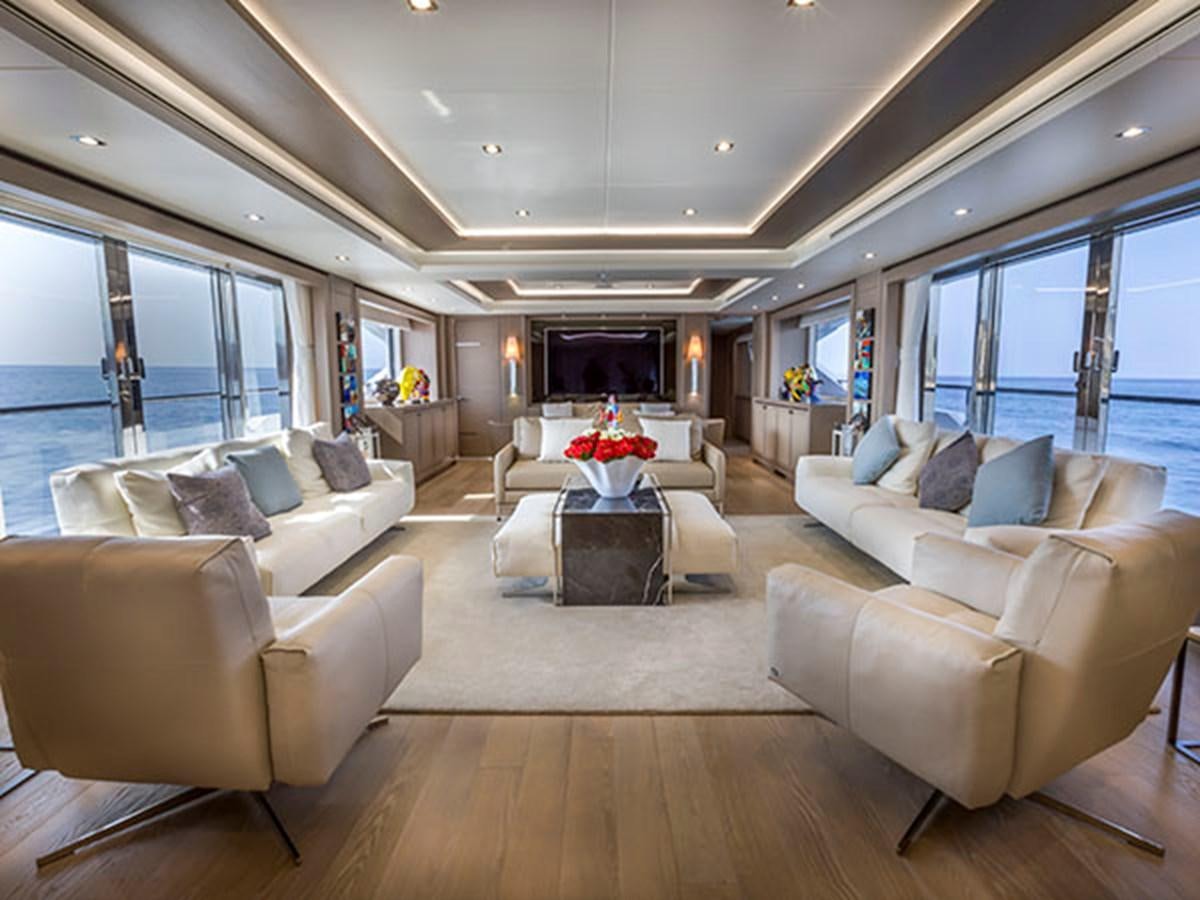 a living room with a large window aboard FREEDOM Yacht for Sale