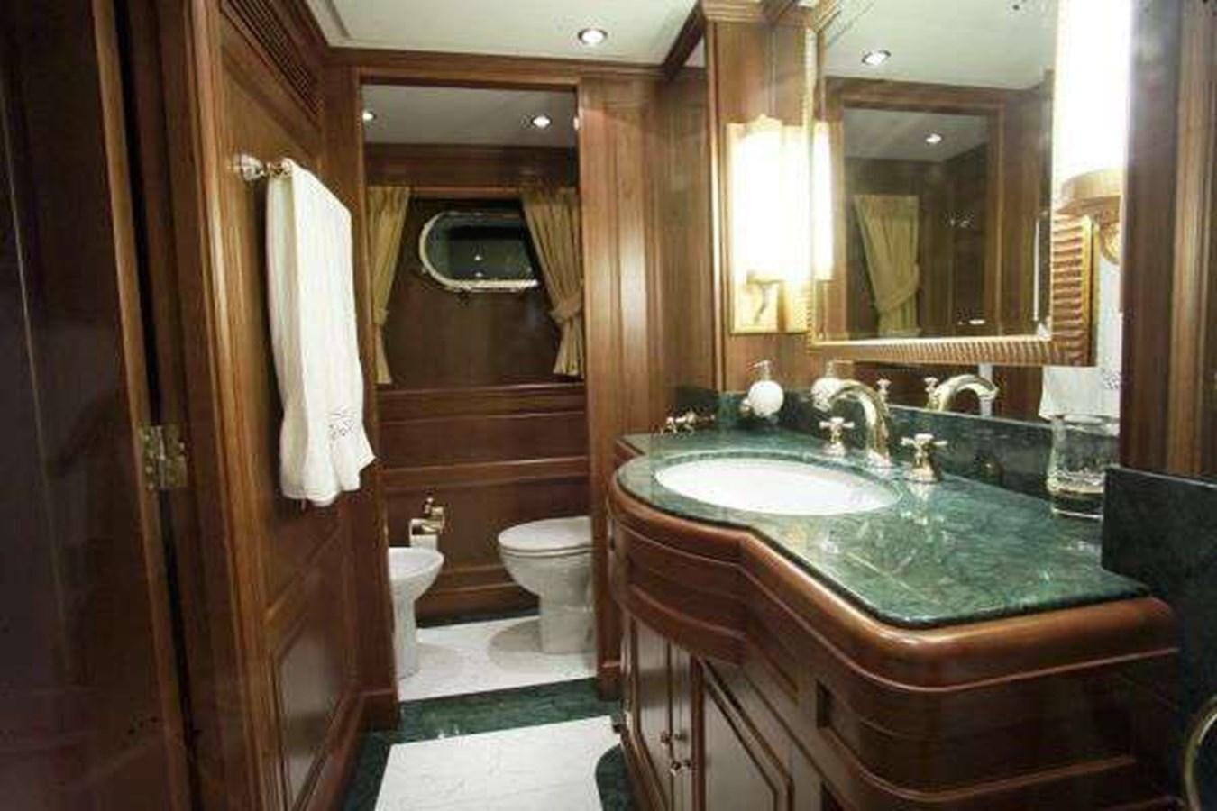 a bathroom with a marble counter aboard ENIGMA Yacht for Sale