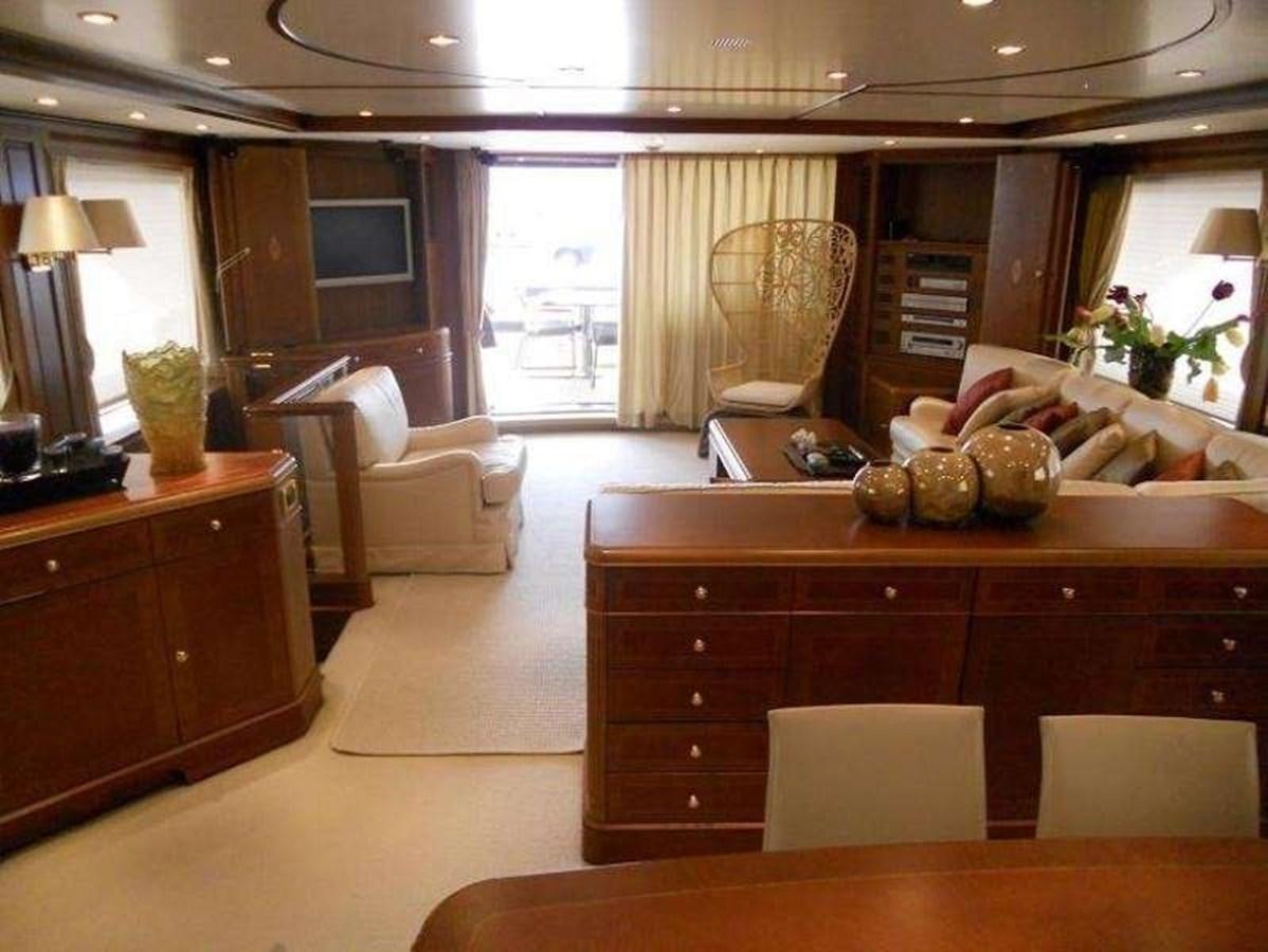 a living room with a large window aboard ENIGMA Yacht for Sale