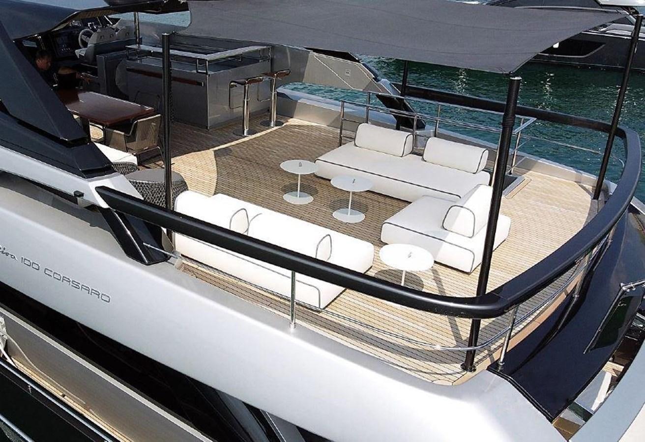 a boat with a table and chairs aboard 100 RIVA CORSARO Yacht for Sale