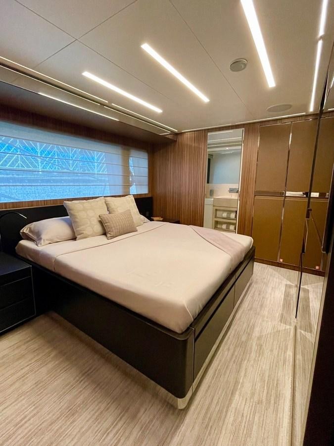 a bed in a room aboard 100 RIVA CORSARO Yacht for Sale