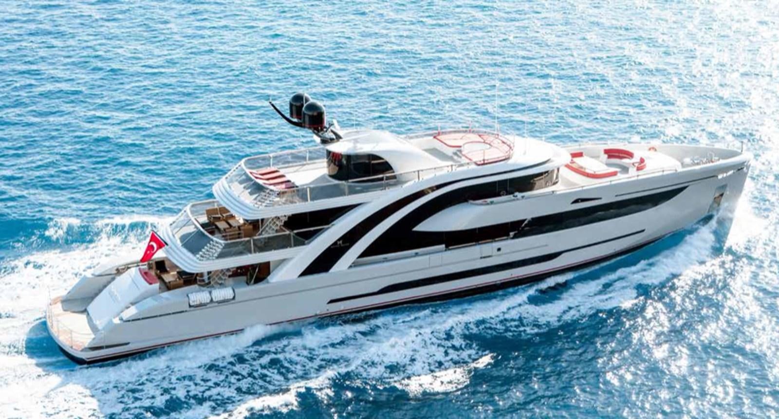 a white boat on the water aboard EUPHORIA II Yacht for Sale
