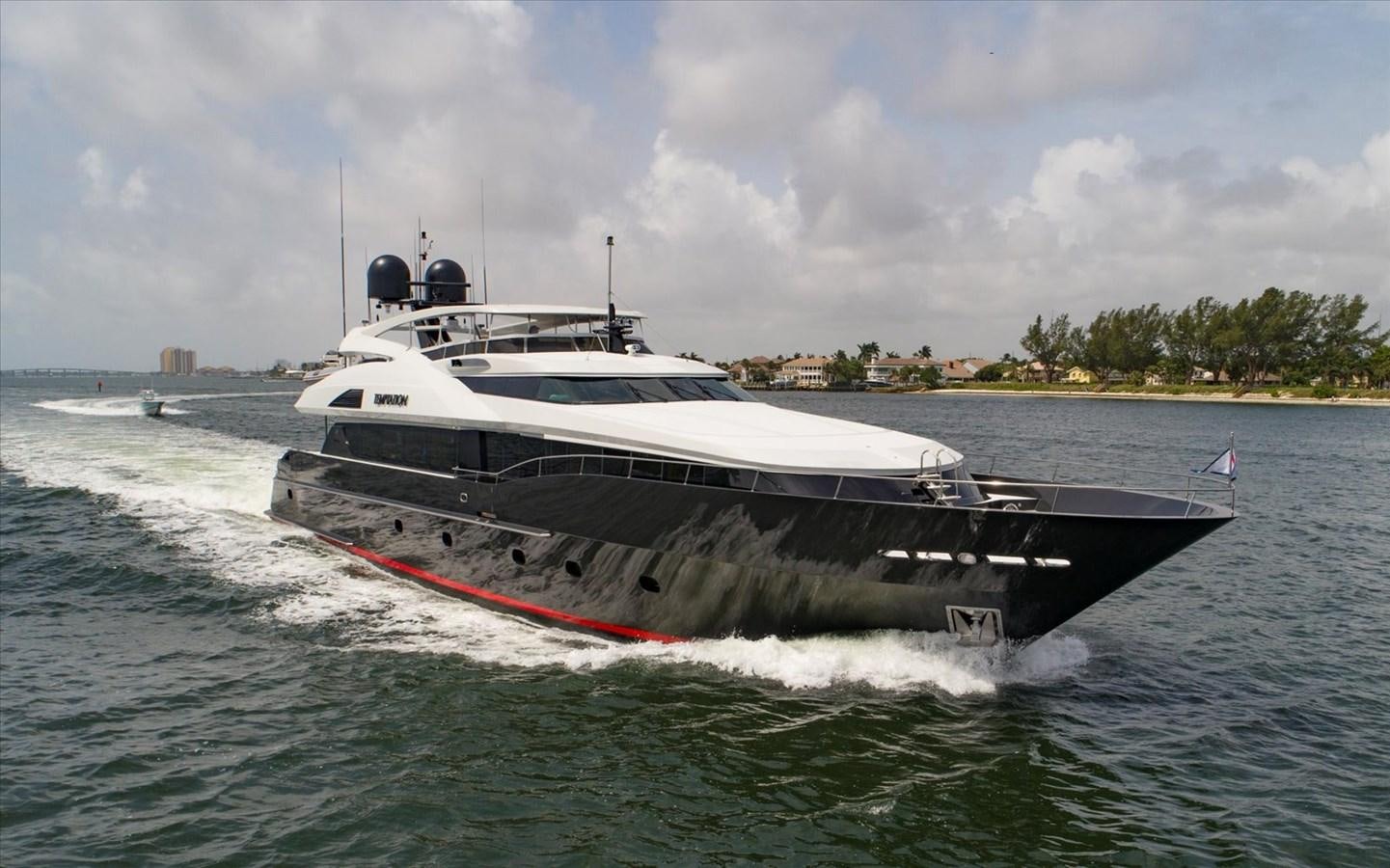 a boat on the water aboard TEMPTATION Yacht for Sale