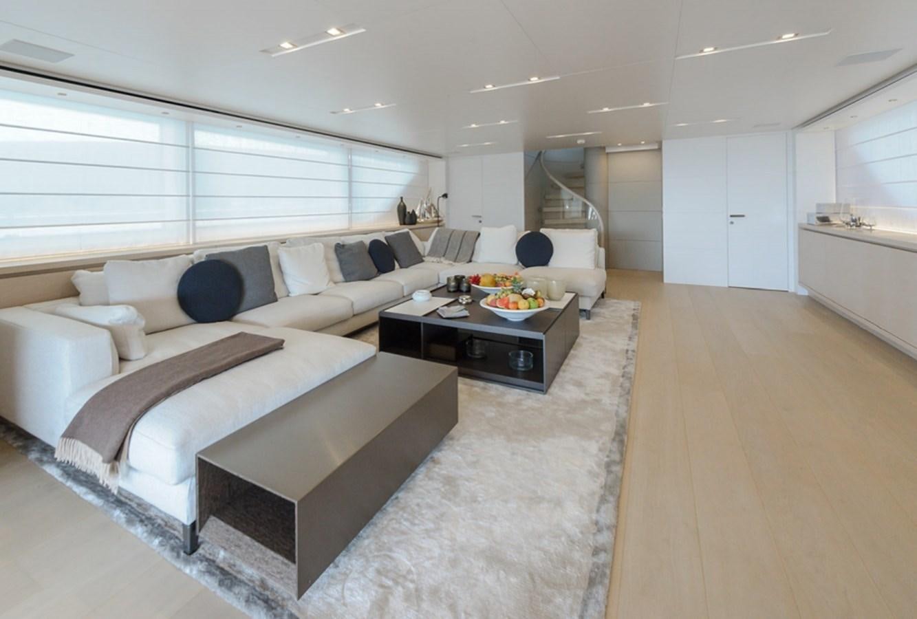 a large living room with white walls aboard SANLORENZO SD112 Yacht for Sale