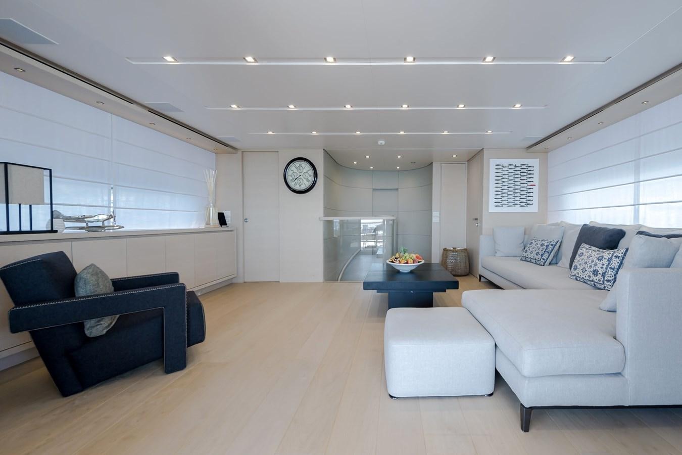 a living room with white couches aboard SANLORENZO SD112 Yacht for Sale