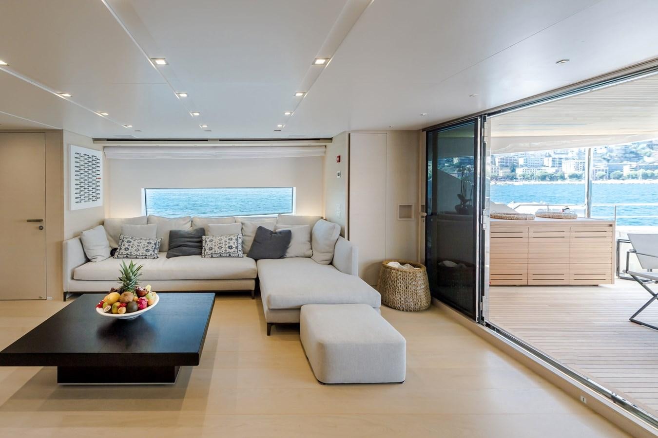 a living room with a large window aboard SANLORENZO SD112 Yacht for Sale