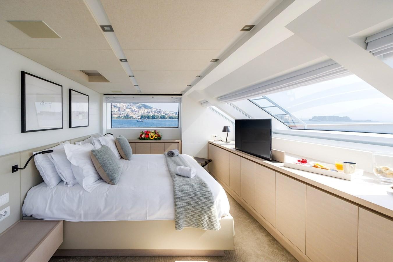 a room with a bed and a tv aboard SANLORENZO SD112 Yacht for Sale