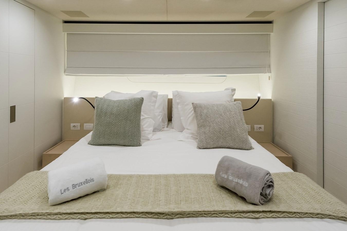 a bed with pillows aboard SANLORENZO SD112 Yacht for Sale