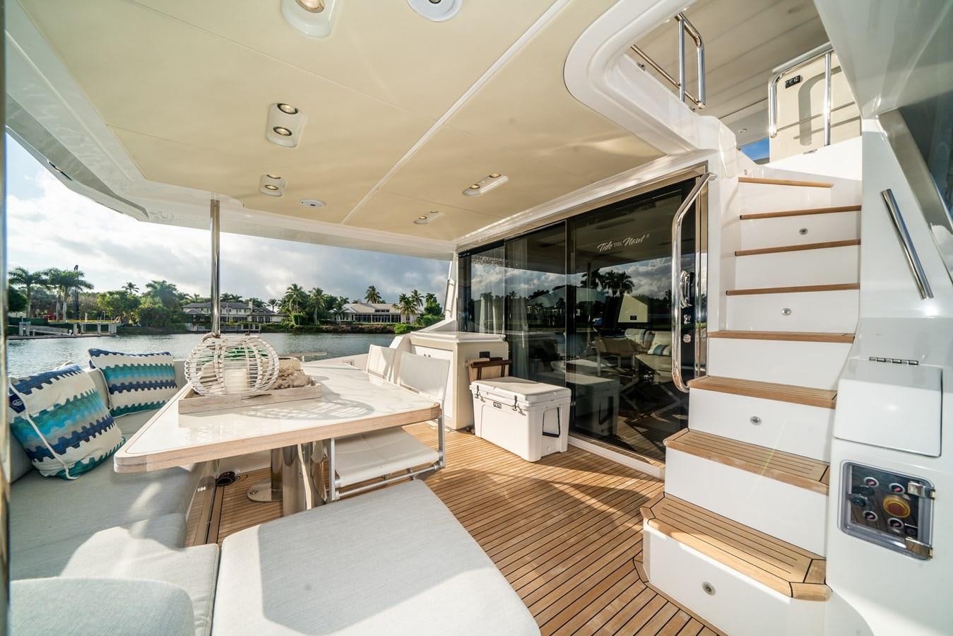 a room with a bed and a table aboard CIAO BELLA Yacht for Sale