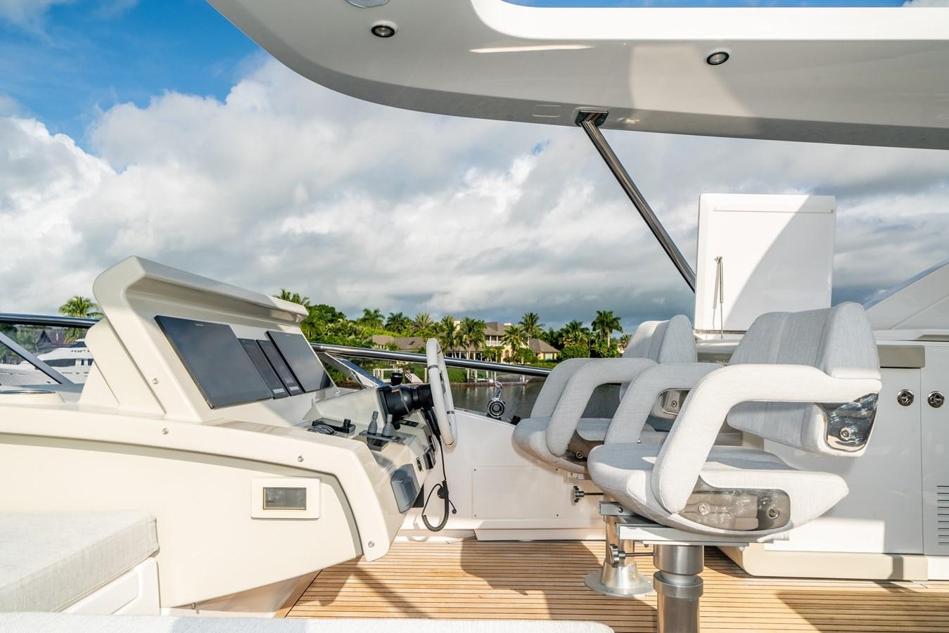 a white boat on a deck aboard CIAO BELLA Yacht for Sale