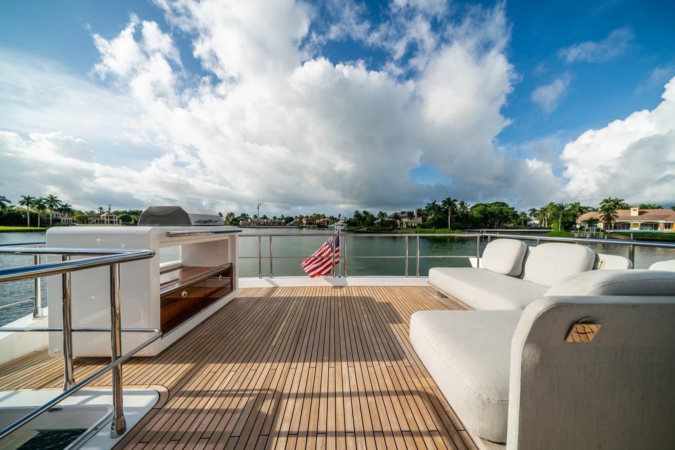 a deck with a flag on it aboard CIAO BELLA Yacht for Sale