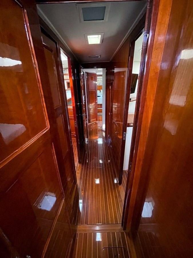a hallway with doors aboard SIROCCO Yacht for Sale
