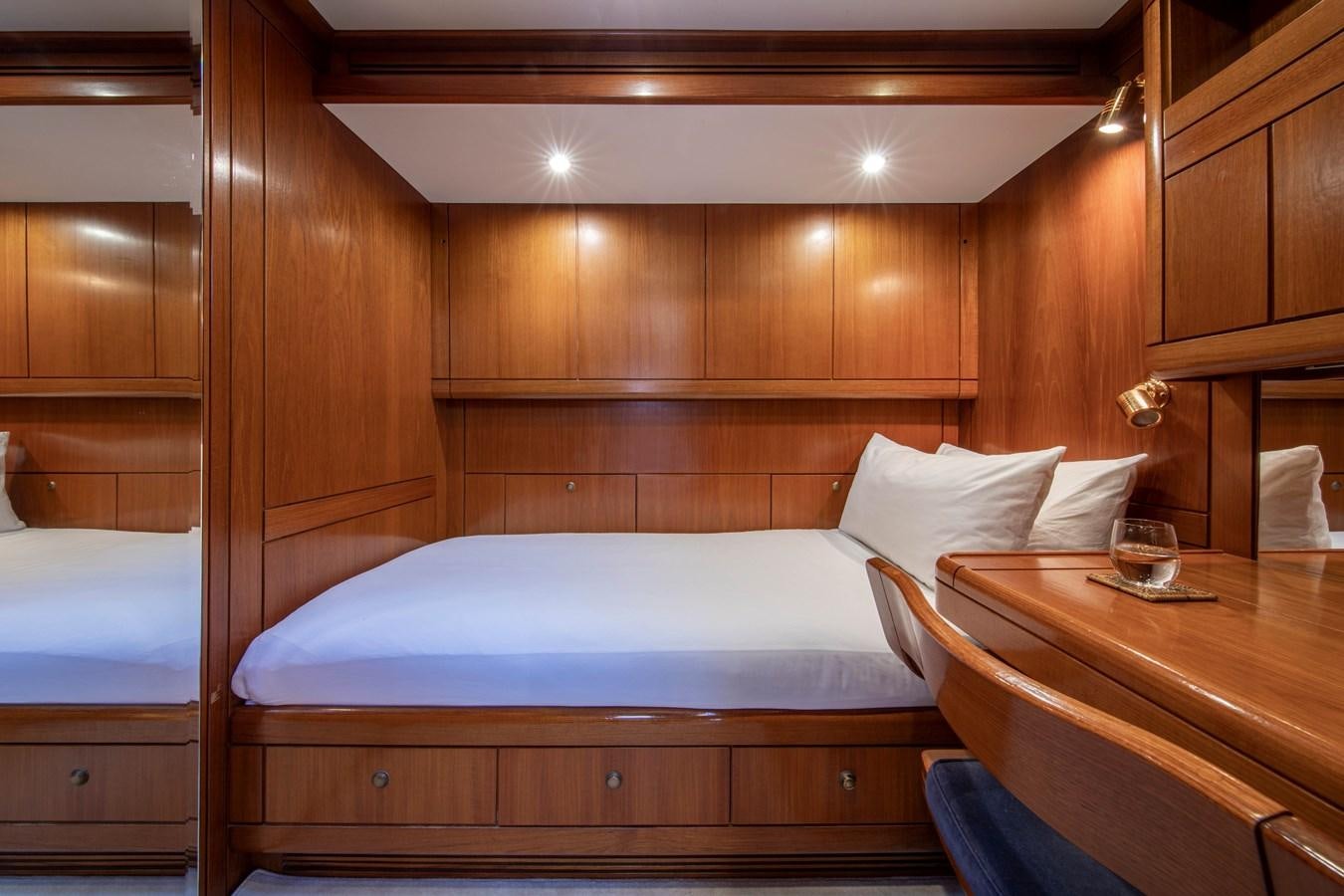 a room with wooden walls aboard MYSTERY Yacht for Sale