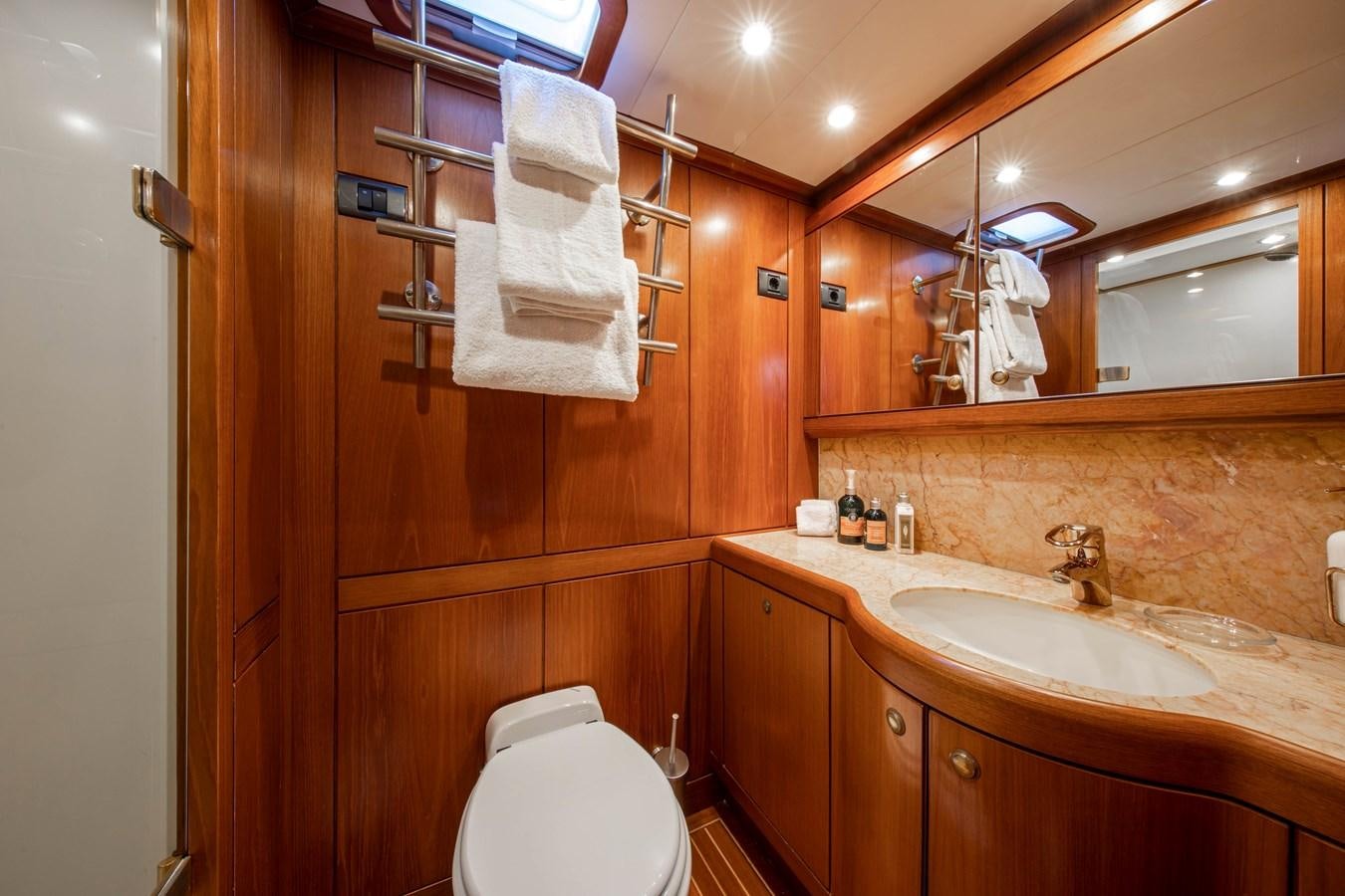 a bathroom with a sink and a toilet aboard MYSTERY Yacht for Sale