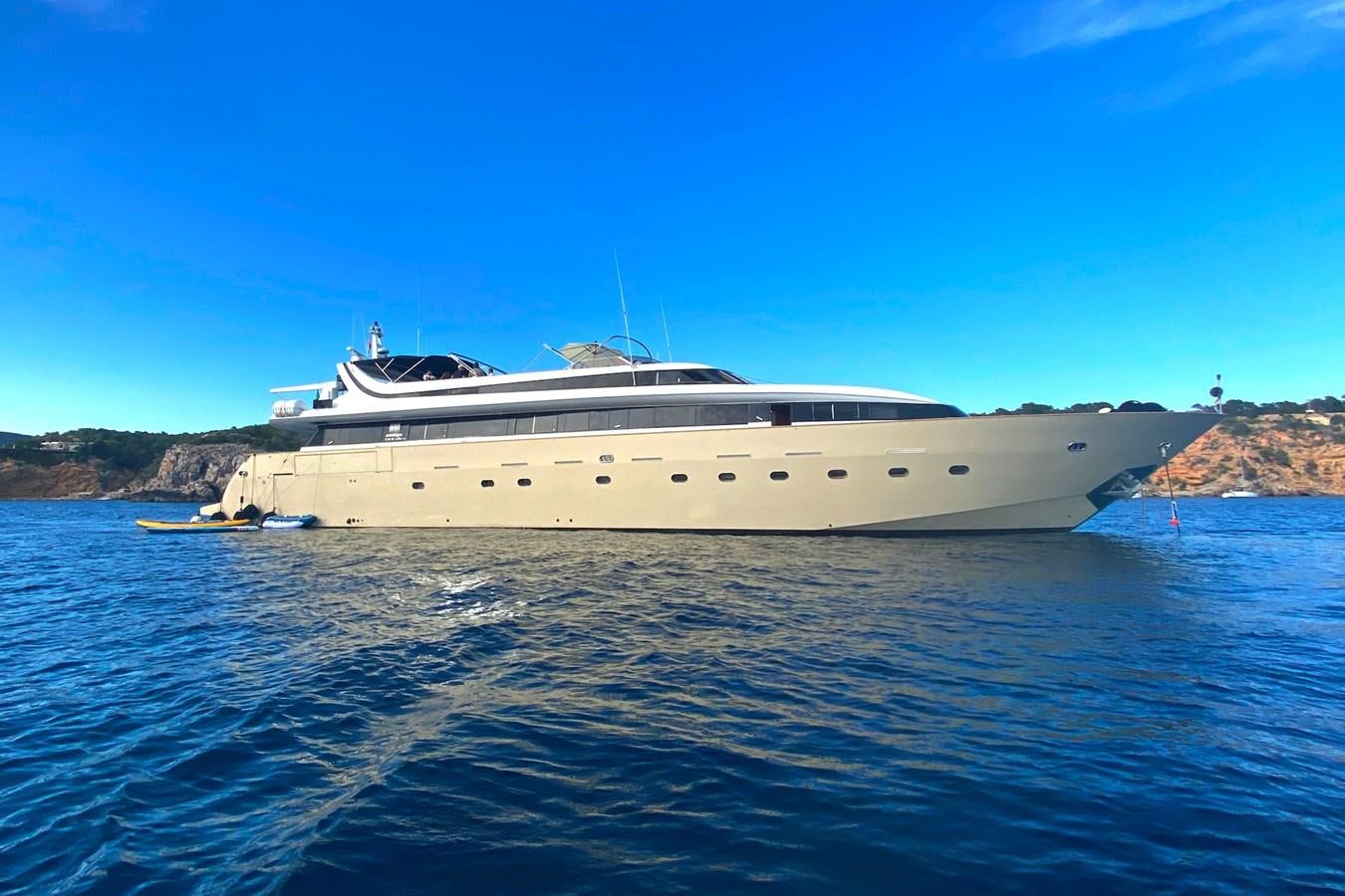 a large white yacht in the water aboard PAULA III Yacht for Sale