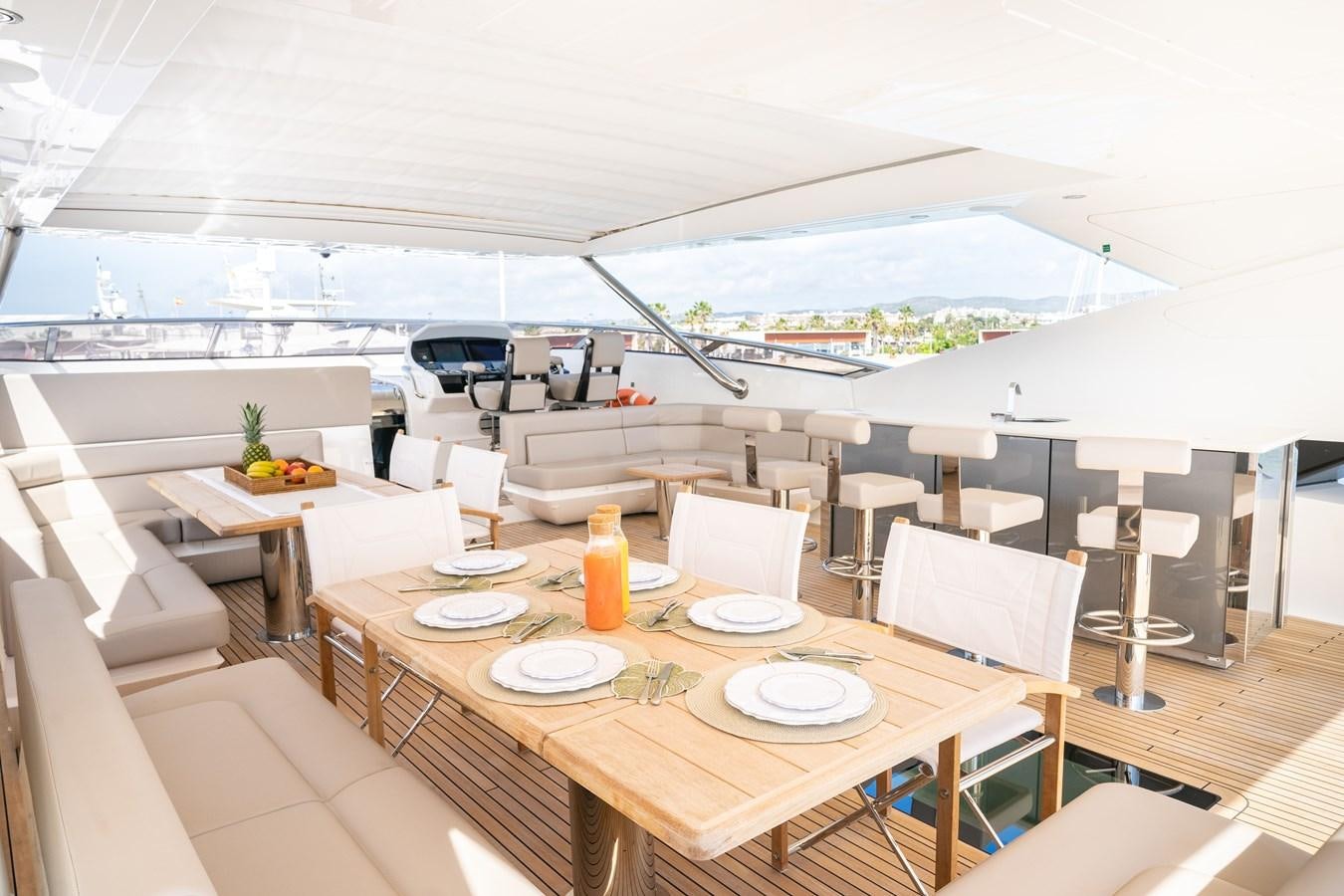 a room with tables and chairs aboard SUNSEEKER 116 -  QART HADASHT Yacht for Sale