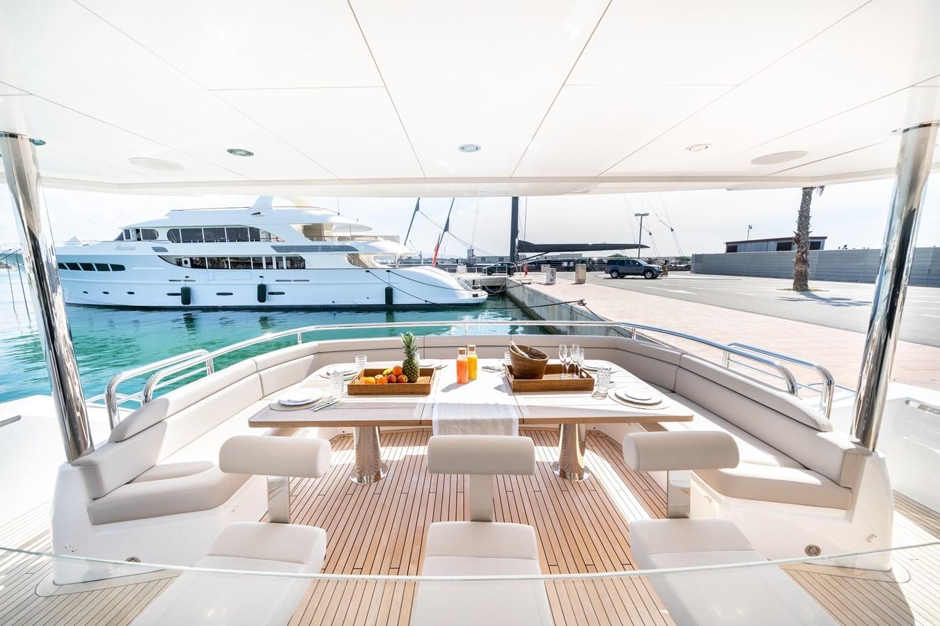 a room with a table and chairs aboard SUNSEEKER 116 -  QART HADASHT Yacht for Sale