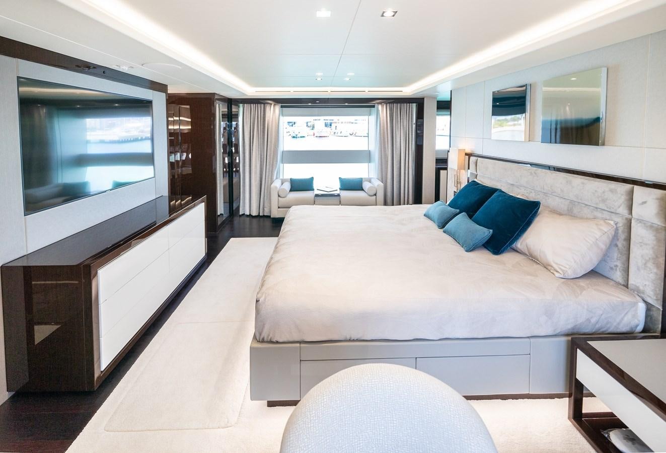 a large white bed in a room aboard SUNSEEKER 116 -  QART HADASHT Yacht for Sale