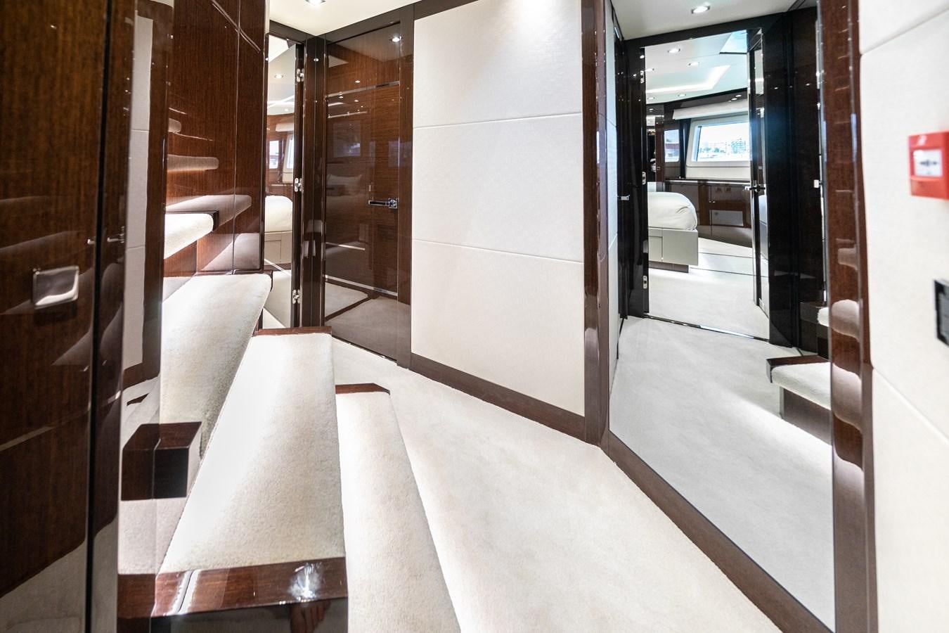 a room with a row of doors aboard SUNSEEKER 116 -  QART HADASHT Yacht for Sale