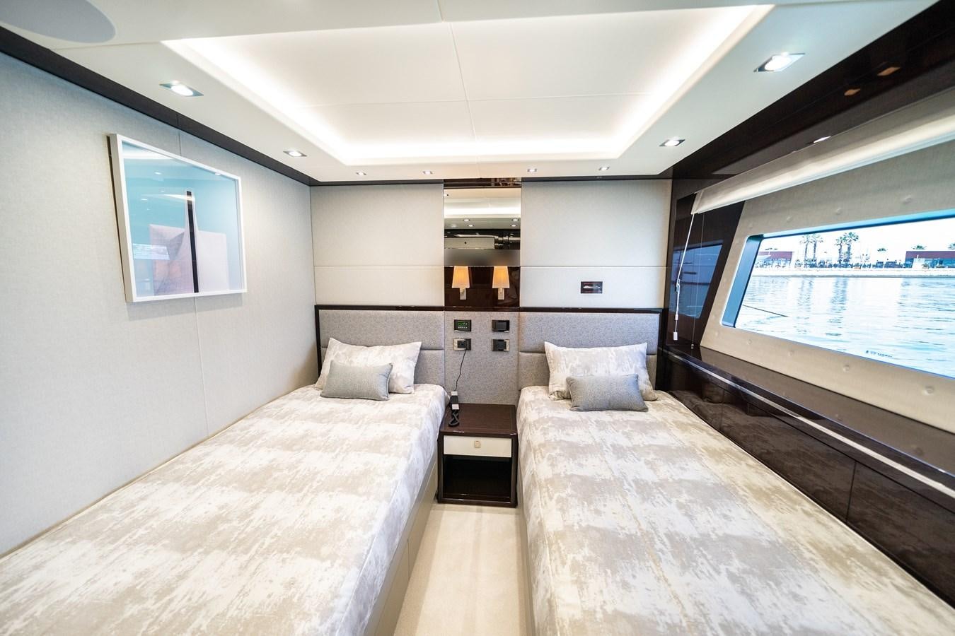 a large bedroom with a large bed aboard SUNSEEKER 116 -  QART HADASHT Yacht for Sale