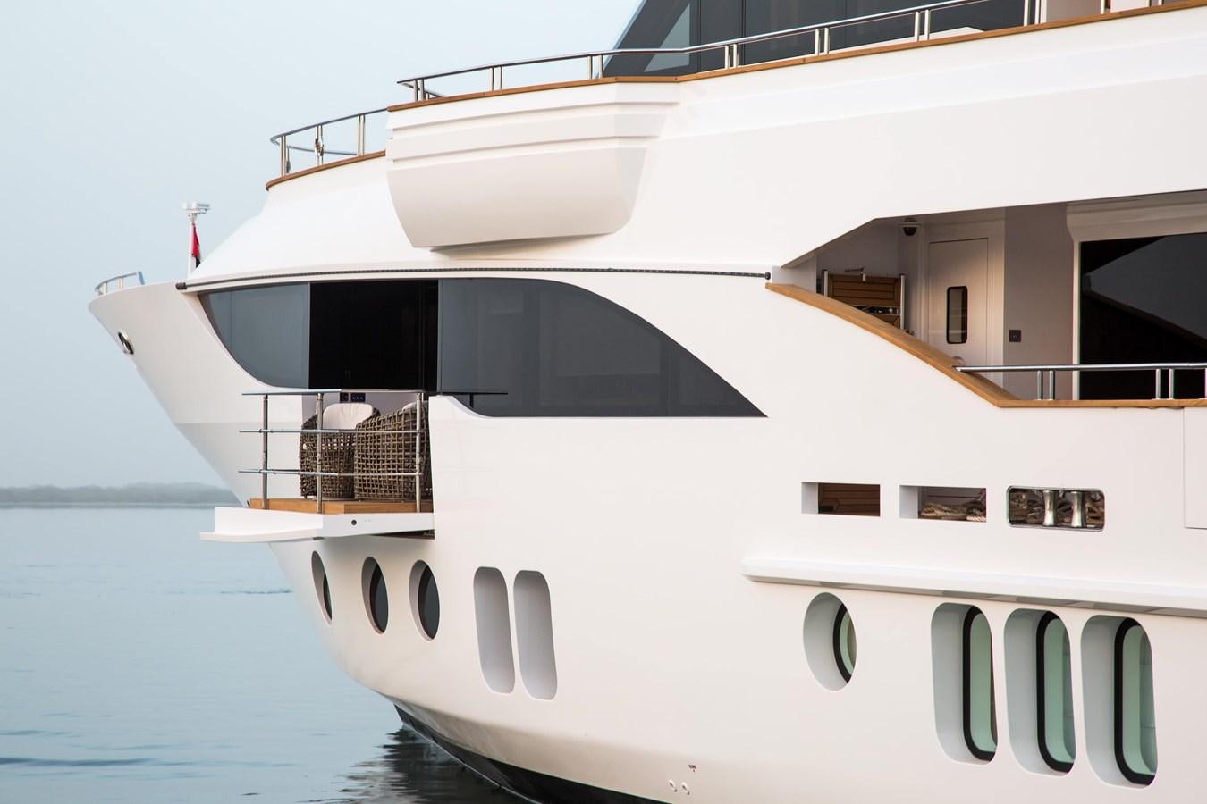a white boat on the water aboard MAJESTY 155 Yacht for Sale