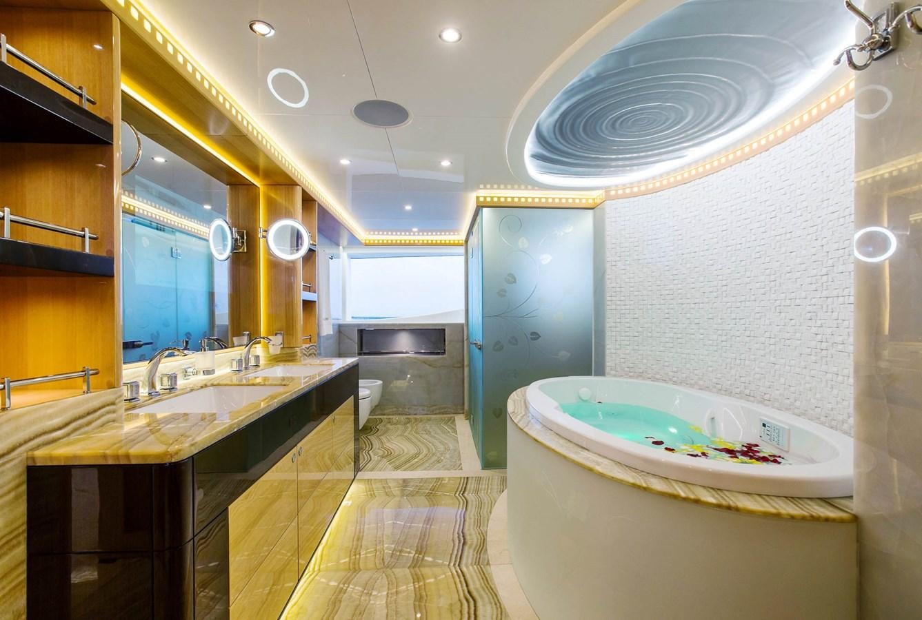 a bathroom with a large jacuzzi tub aboard MAJESTY 155 Yacht for Sale