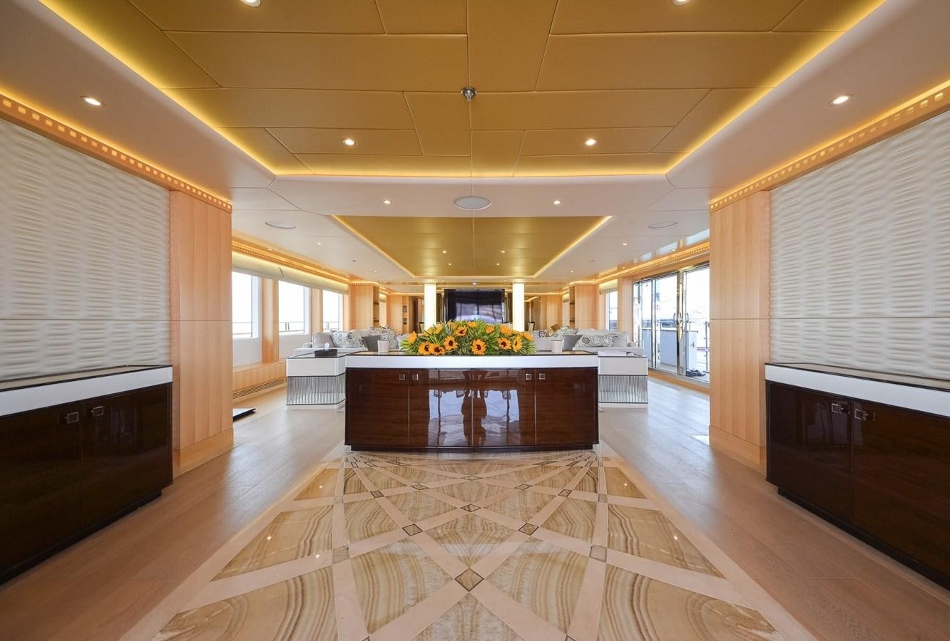 a large kitchen with a large island aboard MAJESTY 155 Yacht for Sale