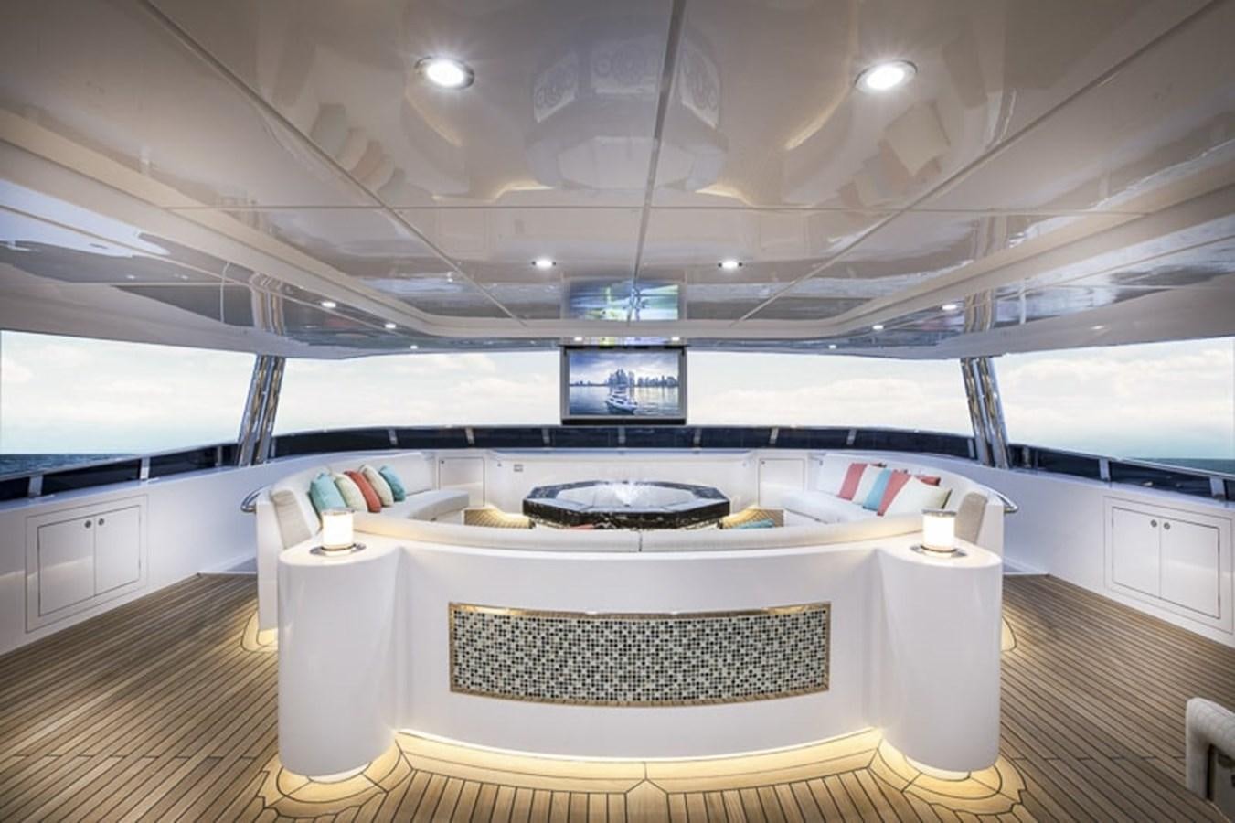a large room with a large white table and chairs aboard MAJESTY 155 Yacht for Sale